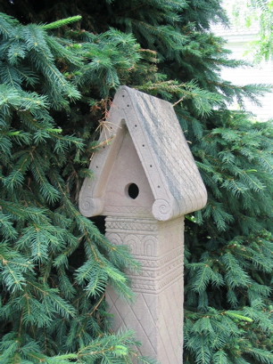 Five foot tall birdhouse in stone